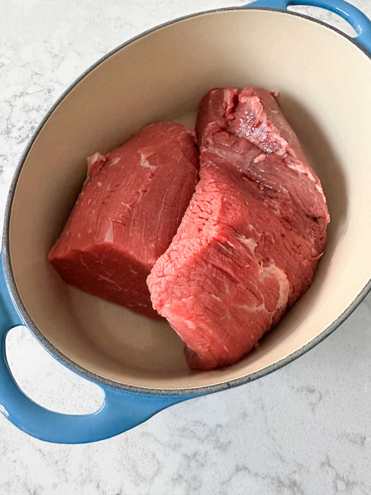 The beef is inside a smaller pot so it will marinate better.