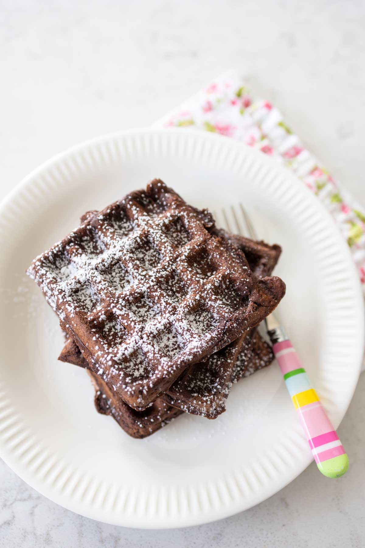 A simple dusting of powdered sugar on the chocolate waffles.