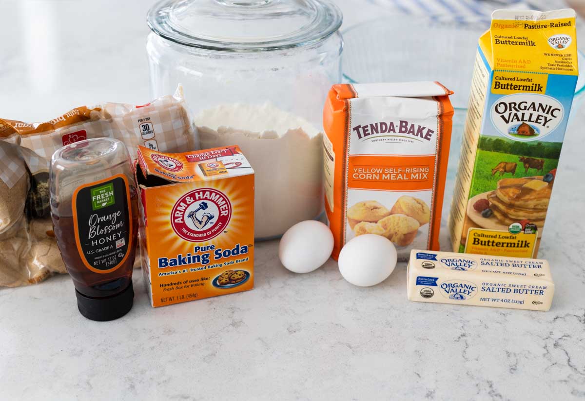 The ingredients to make homemade cornbread are on the counter.