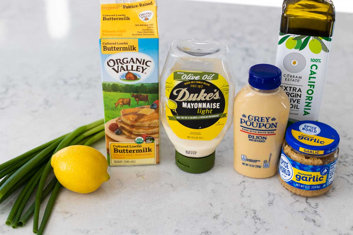 The ingredients to make the homemade dressing are on the counter.