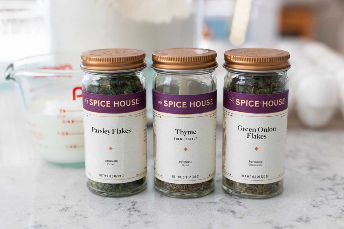 3 spice jars in a row show how you can mix up the spaetzle flavor. 