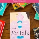 The copy of the book club book The Ex Talk is on the table.