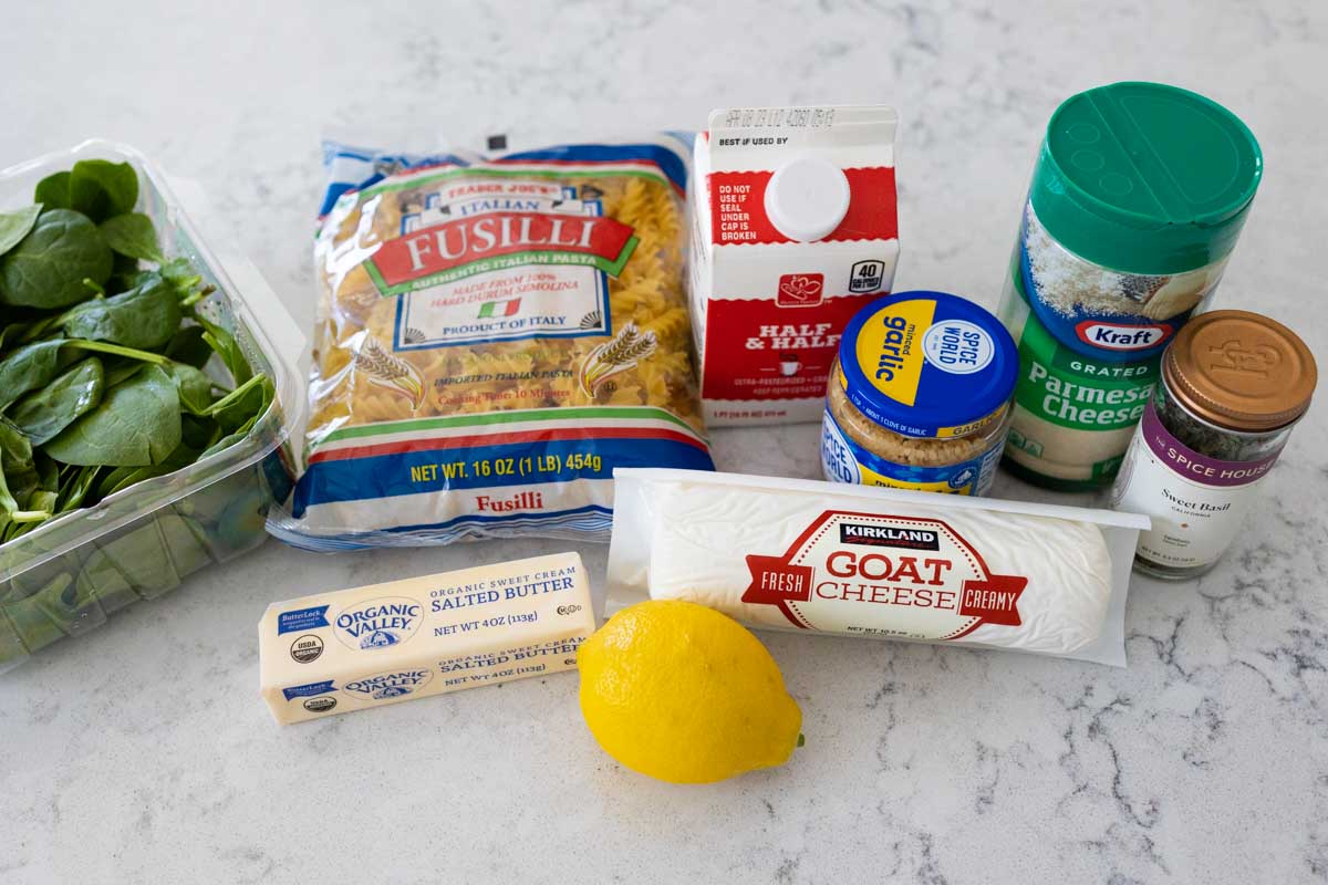 The ingredients to make the pasta dish with goat cheese sauce are on the counter.