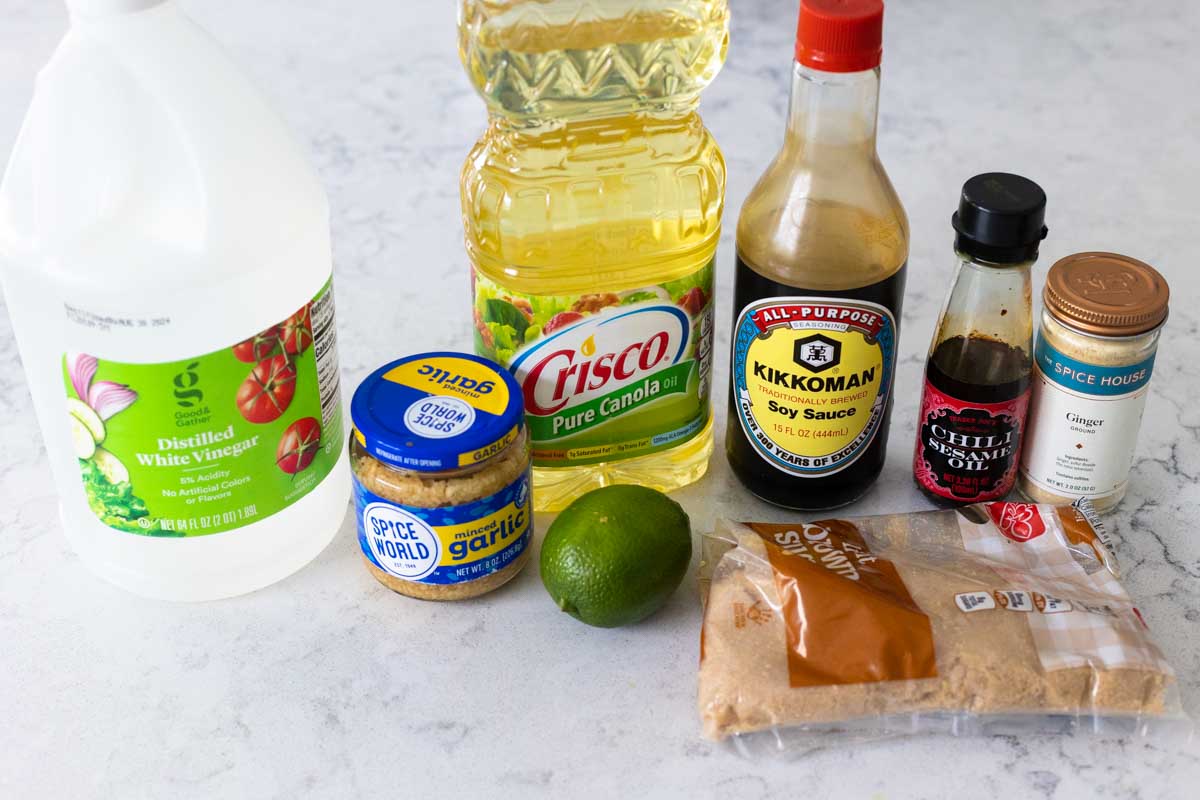 The ingredients to make the Asian lime vinaigrette are on the counter.
