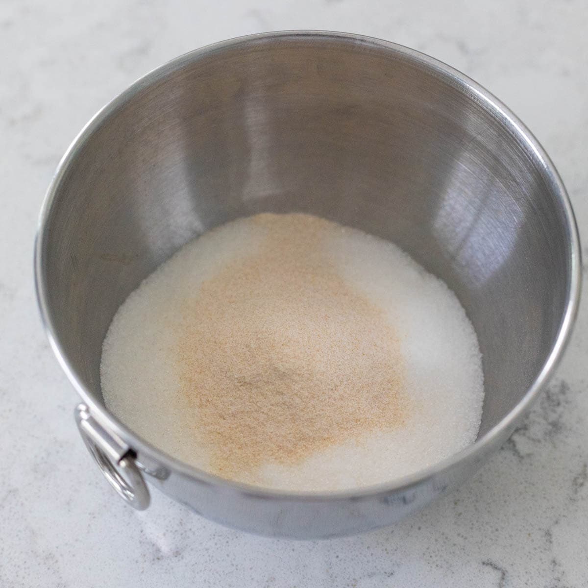 The sugar and pectin have been mixed in a bowl.