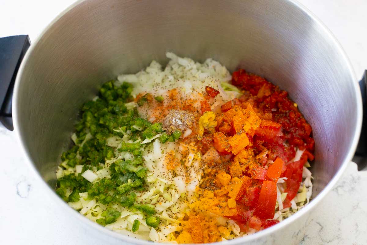 The ingredients have all been prepped and added to a large pot.