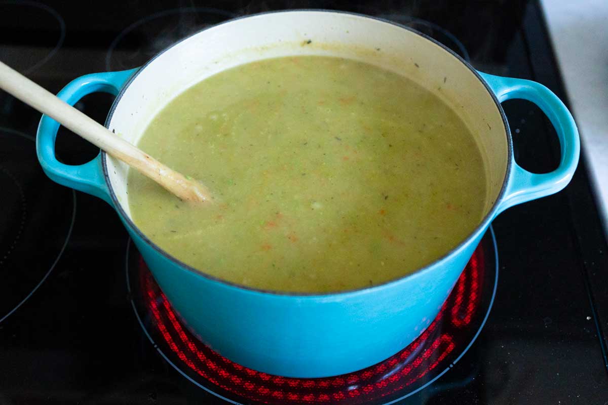 The finished soup is in the pot, it has a light green color because of the leeks.