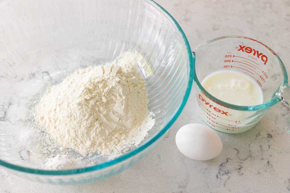 The ingredients to make the dumplings are prepped and on the counter.