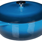 A blue dutch oven with lid.