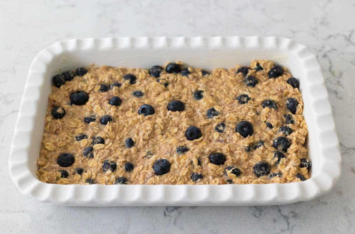 The oatmeal has been in the fridge overnight and you can now see that the oats have absorbed the liquid and puffed up.