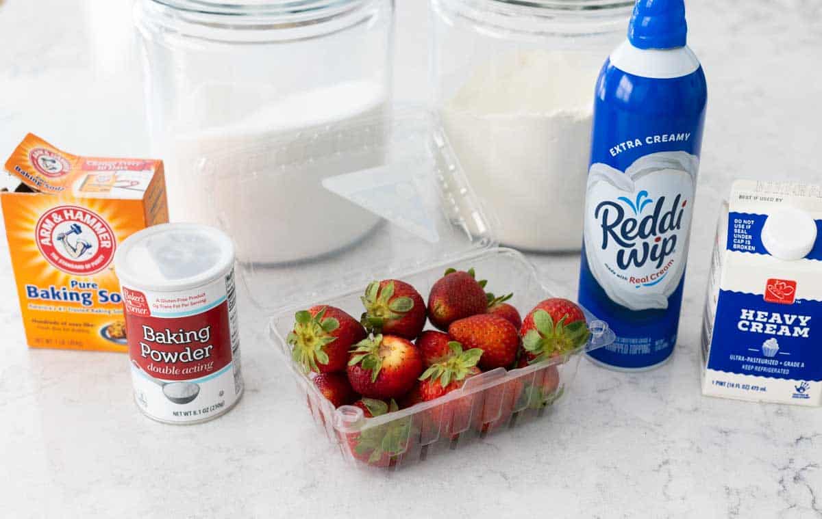 The ingredients to make the shortcakes are on the counter.