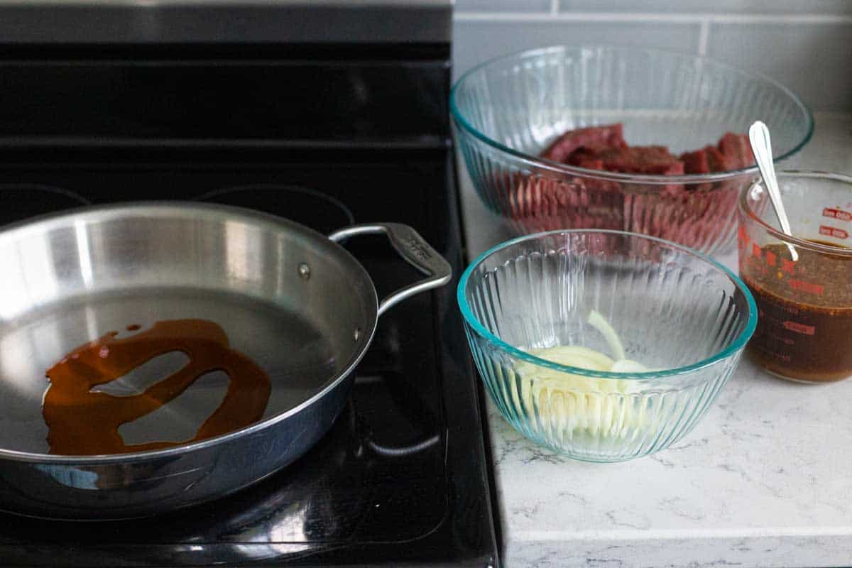 The photo shows the set up at the stove for the stir fry cooking.