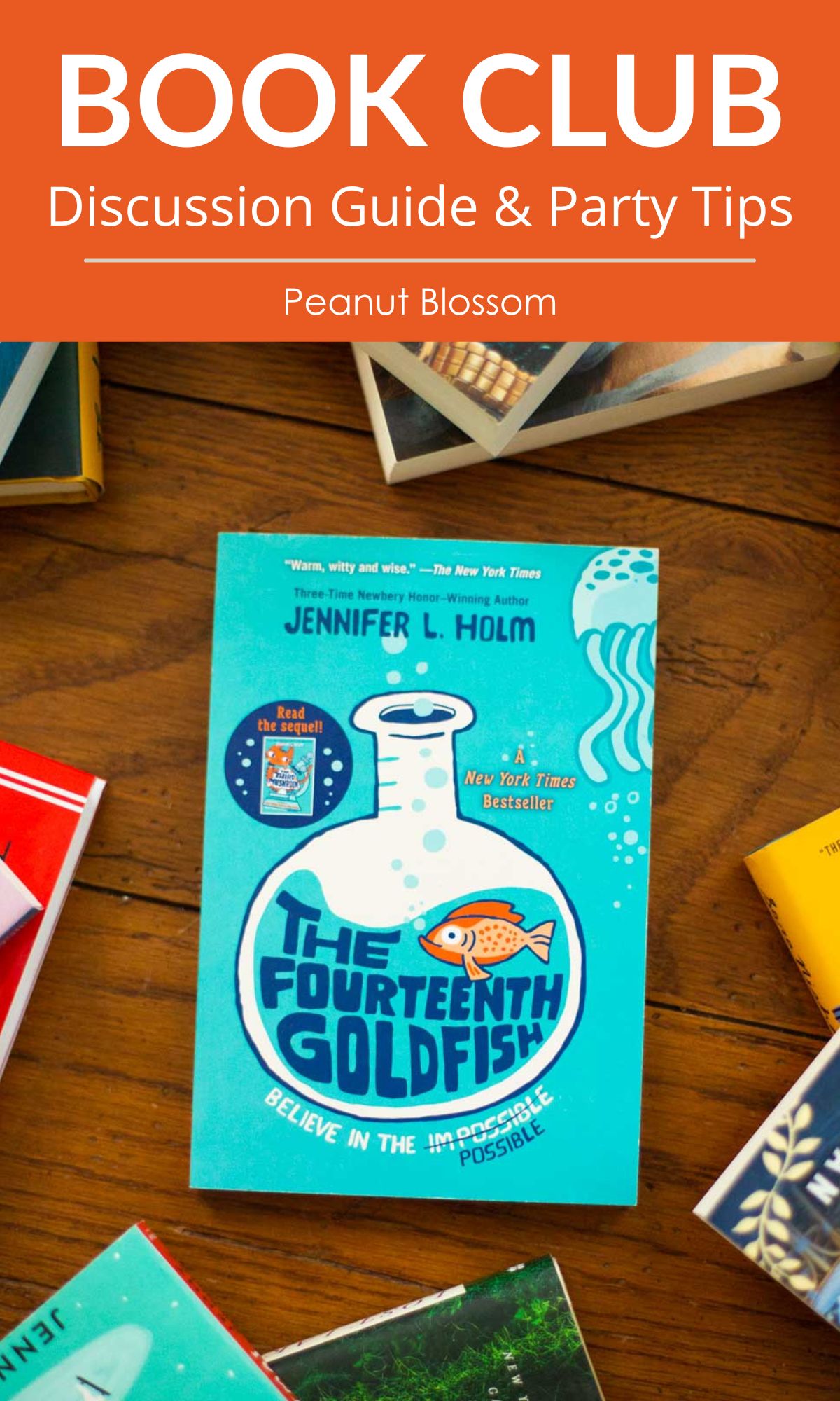 A copy of The Fourteenth Goldfish by Jennifer L. Holm sits on a table.