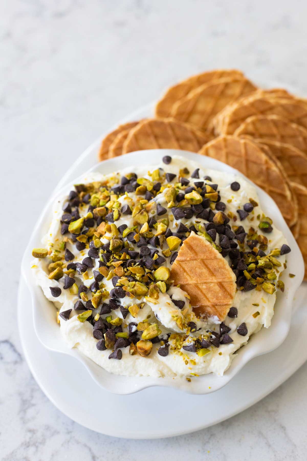 The authentic cannoli dip has chopped pistachios sprinkled on top for crunch.