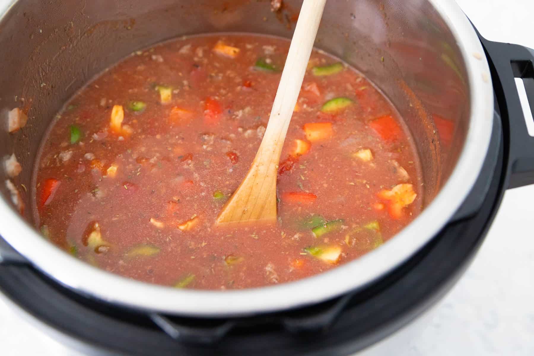 The soup is fully stirred together and will now cook in the Instant Pot.