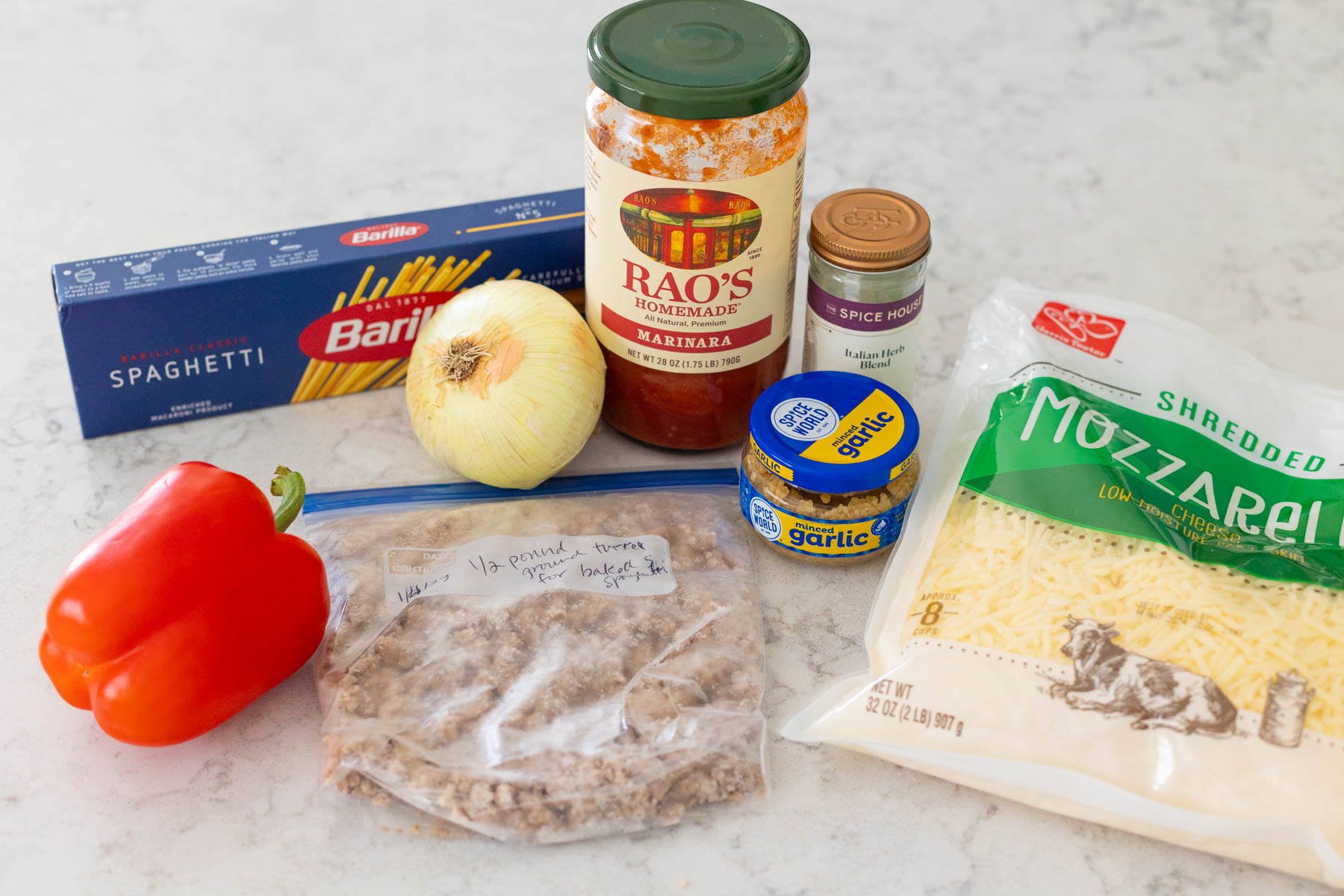The ingredients to make the baked spaghetti casserole are on the counter.