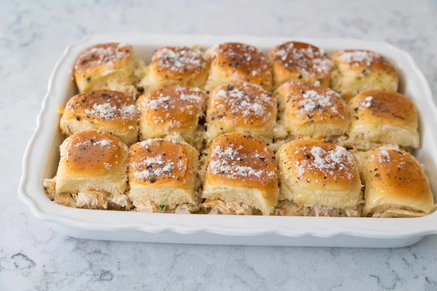 The baking pan is about to go in the oven.