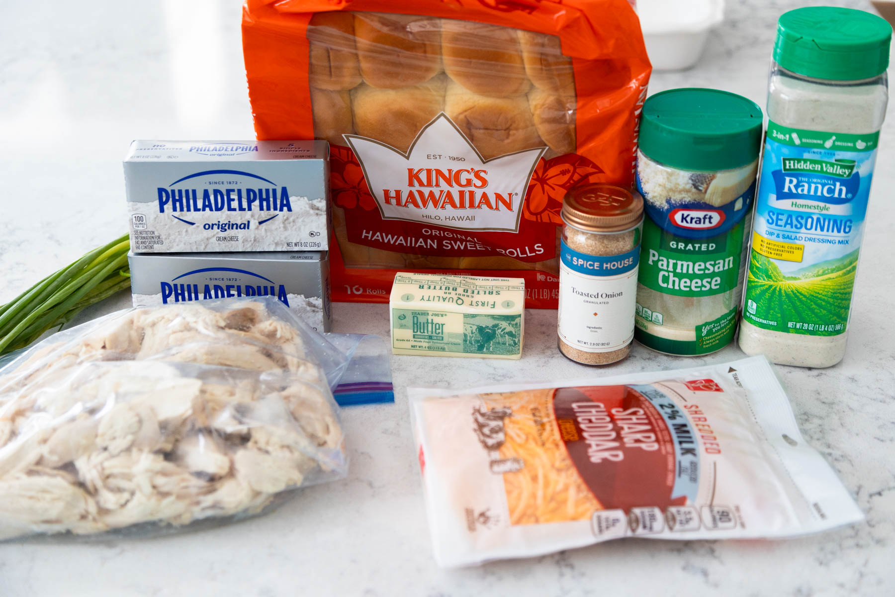 The ingredients to make the crack chicken sliders are on the counter.