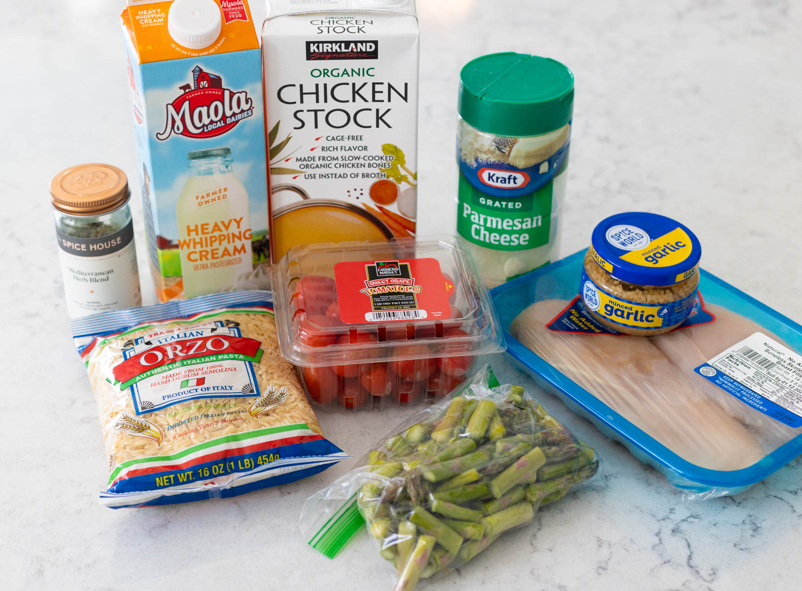 The ingredients to make the creamy orzo with chicken are on the counter.