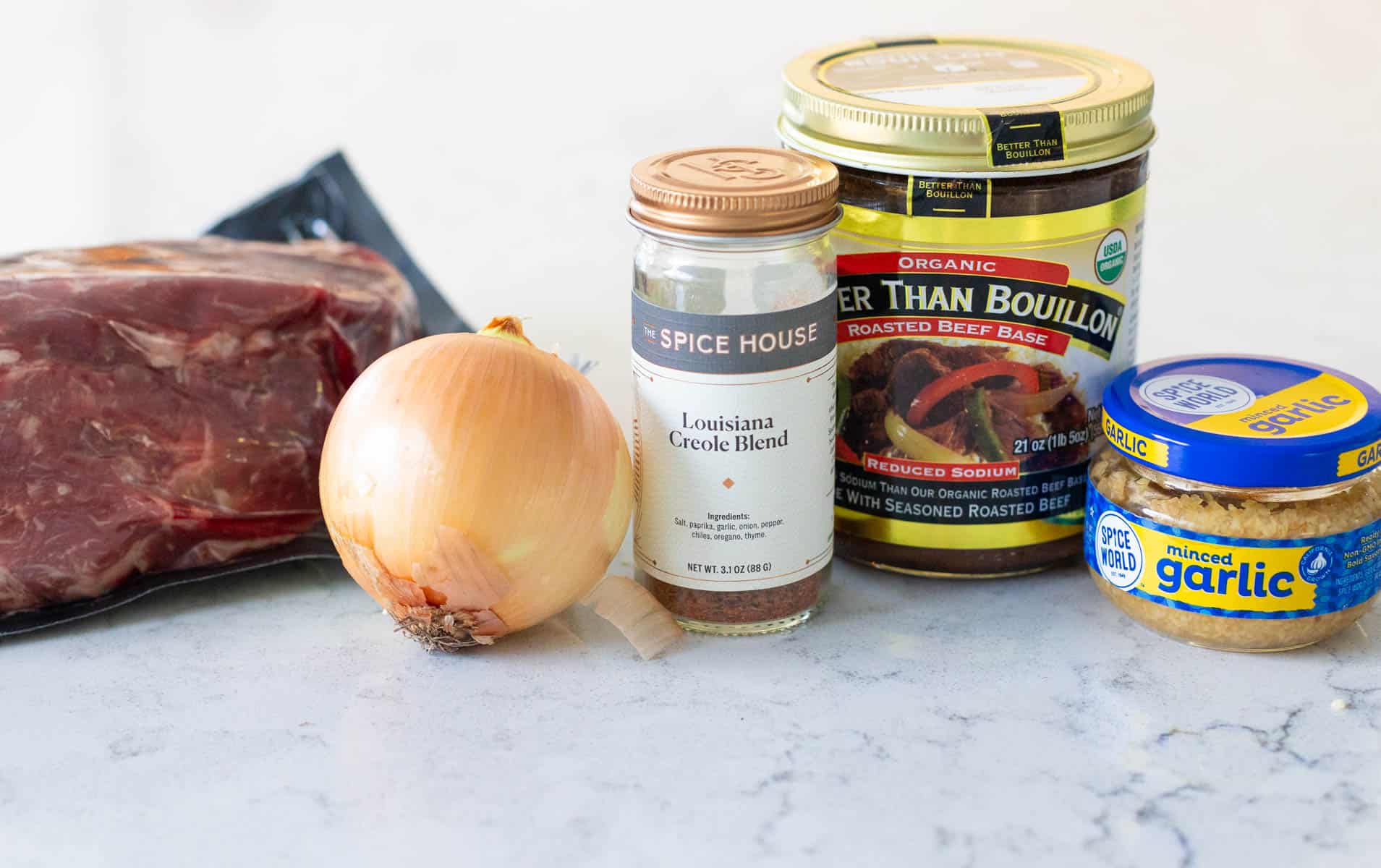 The ingredients to make the shredded beef for the po'boy sandwiches are on the counter.