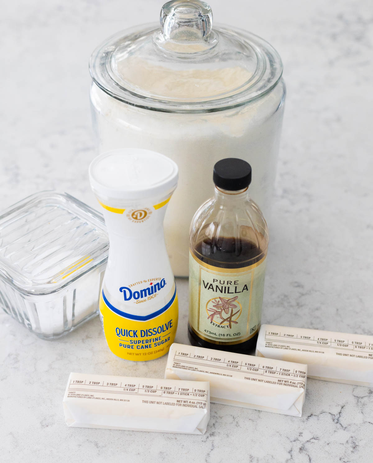 The ingredients to make homemade shortbread are on the counter.