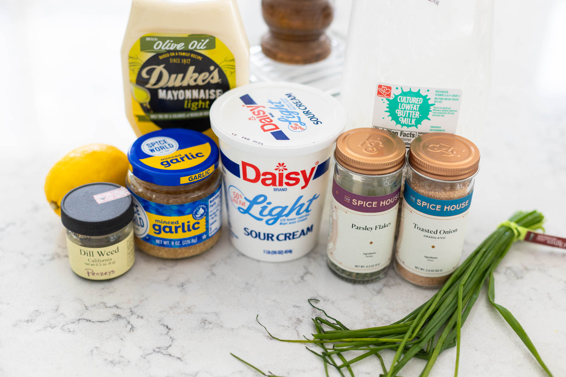The ingredients to make ranch dip are on the counter.