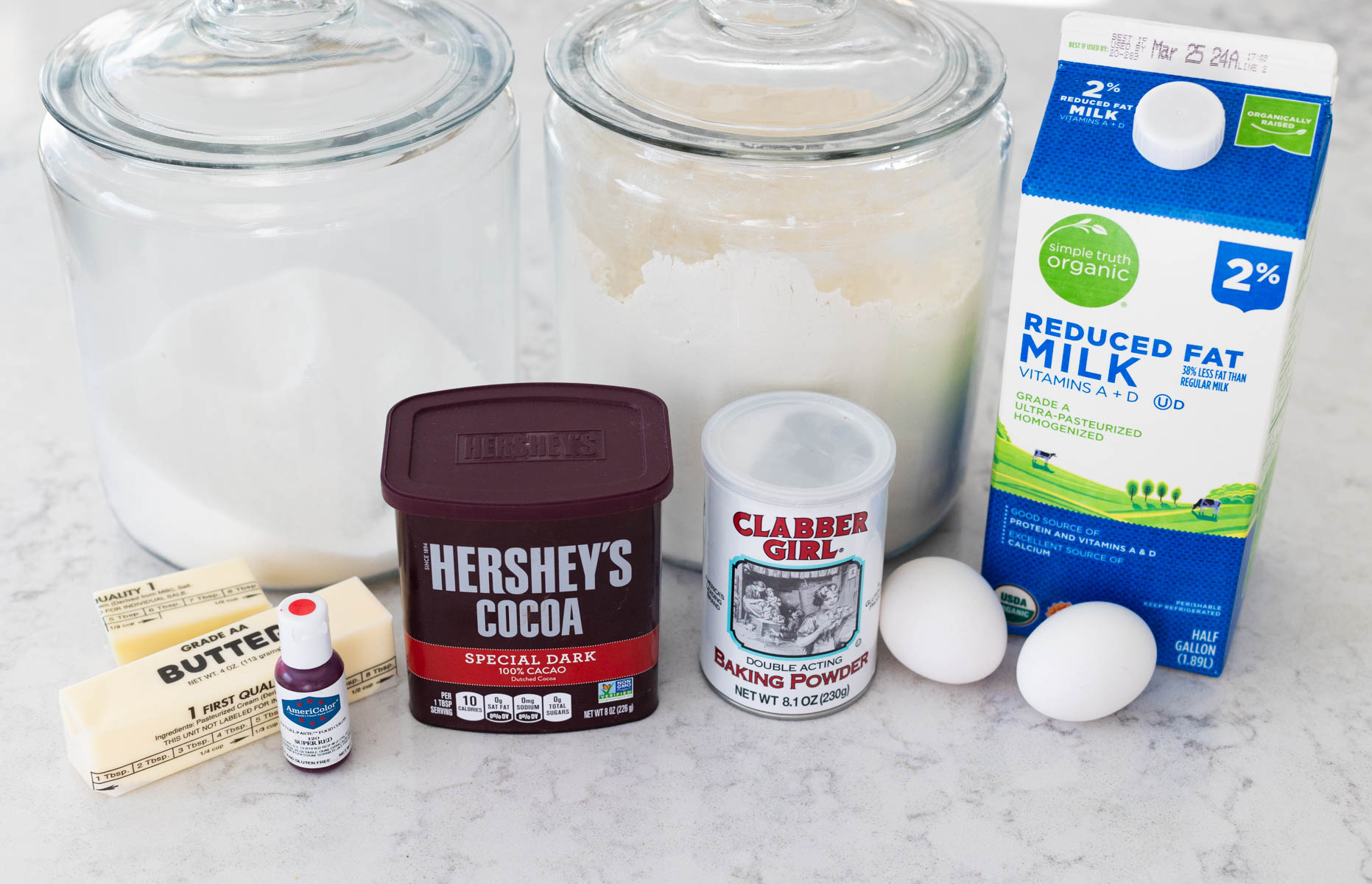 The ingredients to make red velvet waffles are on the counter.