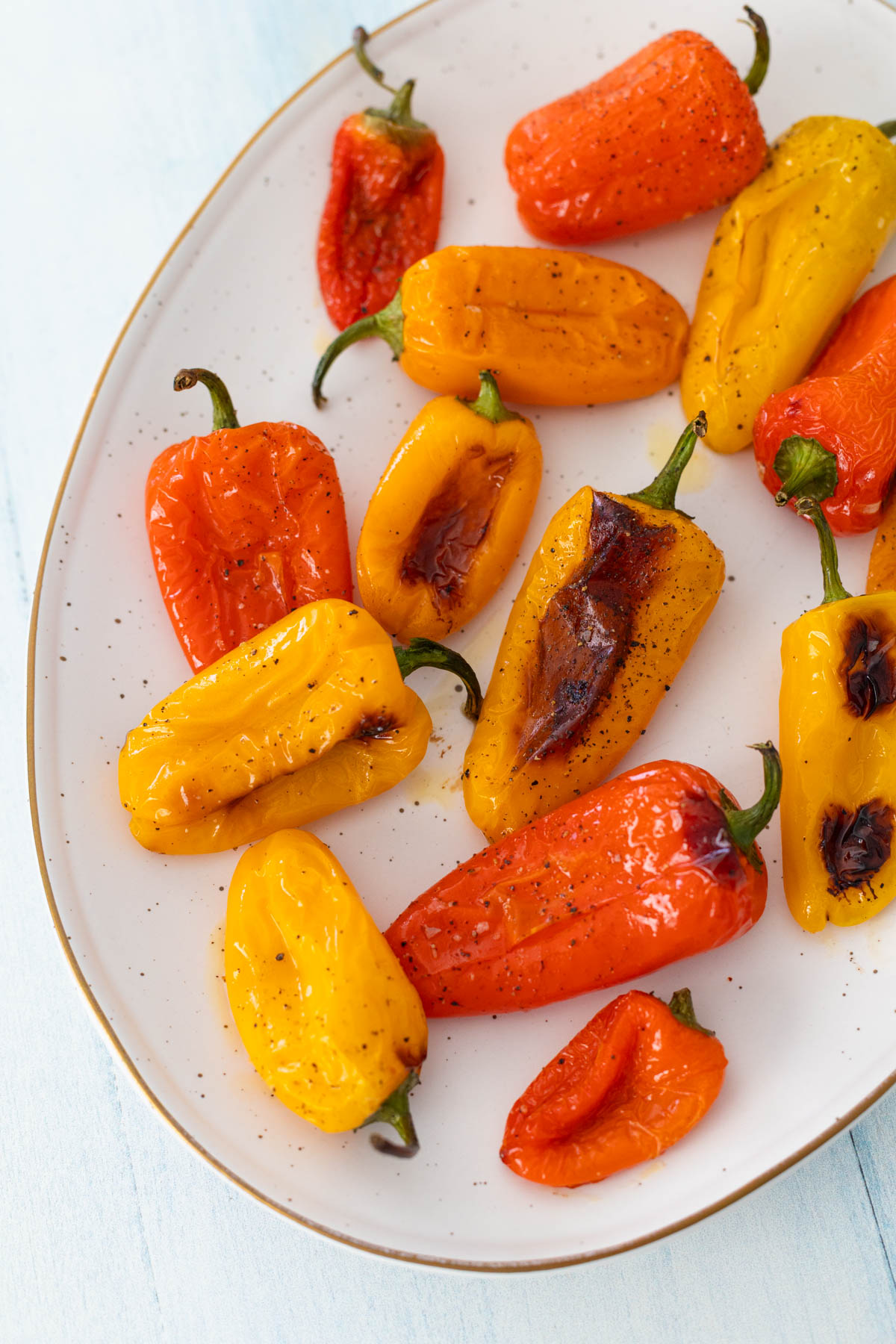 The mini peppers are perfectly charred and served at the table.