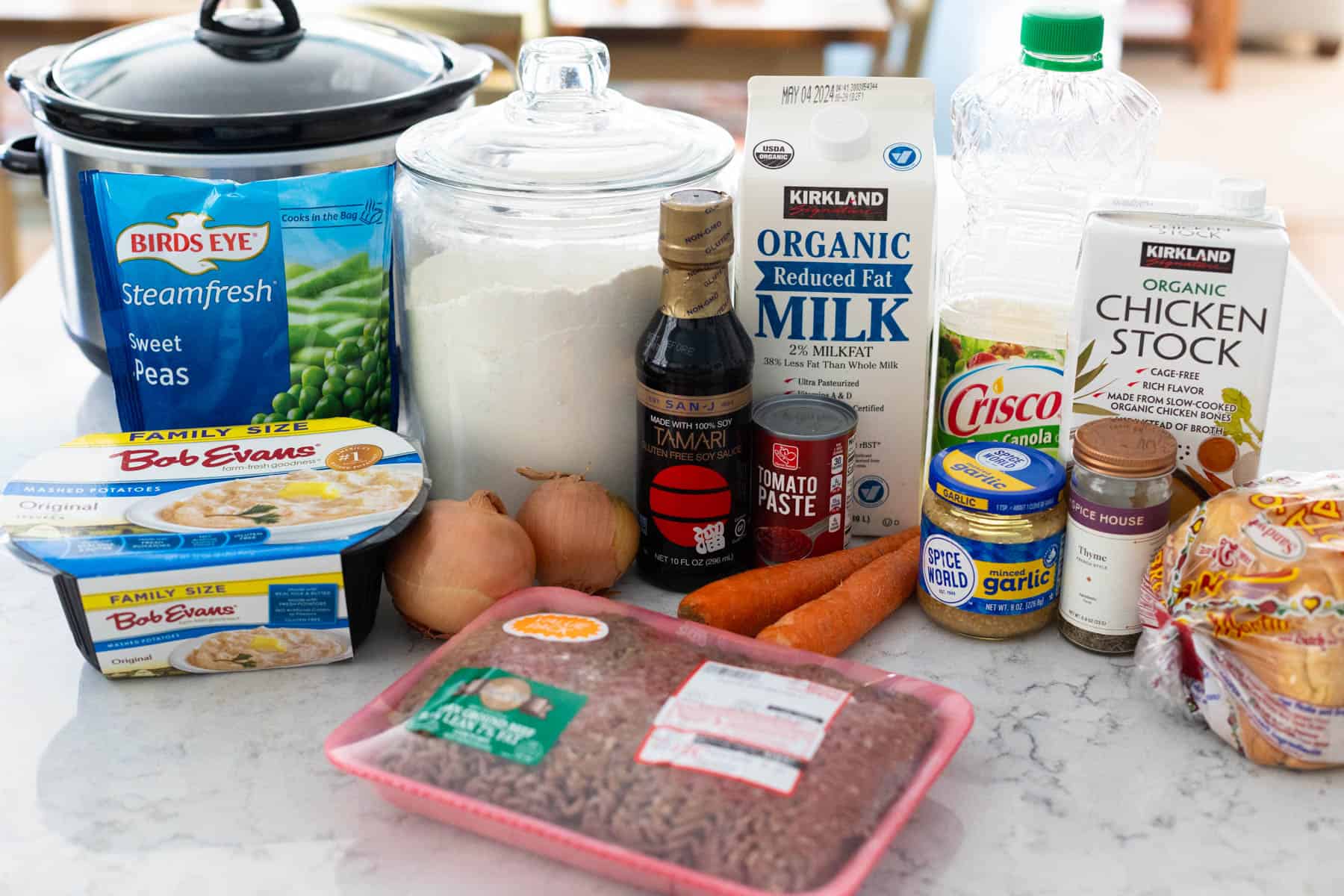 The ingredients to make shepherds pie in the slowcooker are on the counter.