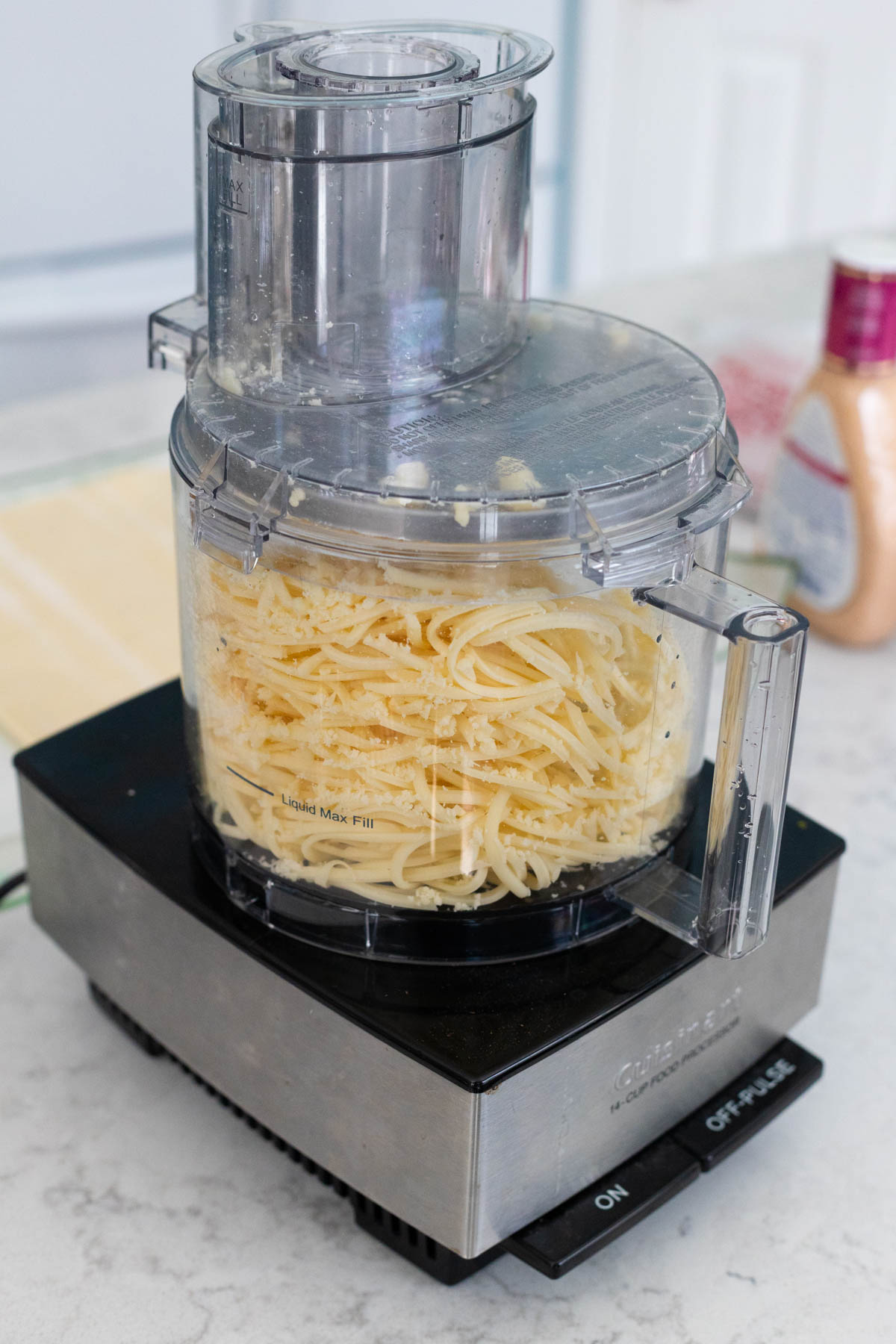 The swiss cheese has been shredded in a food processor.