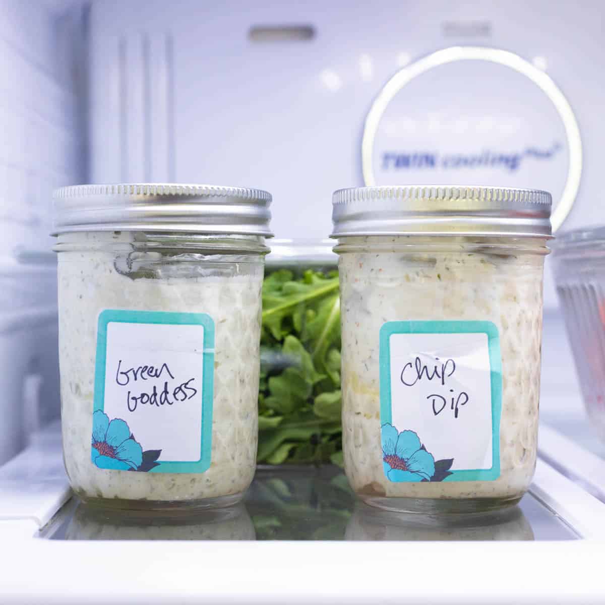 Mason jars filled with homemade veggie dips.
