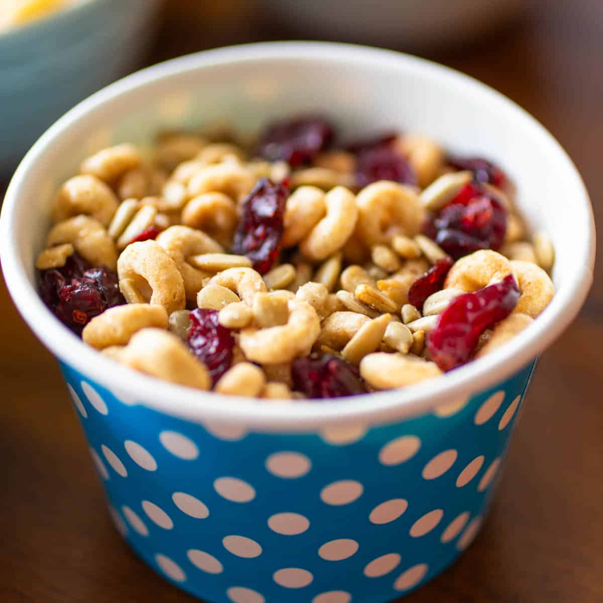 Cheerios are mixed with dried cherries and sunflower seeds.