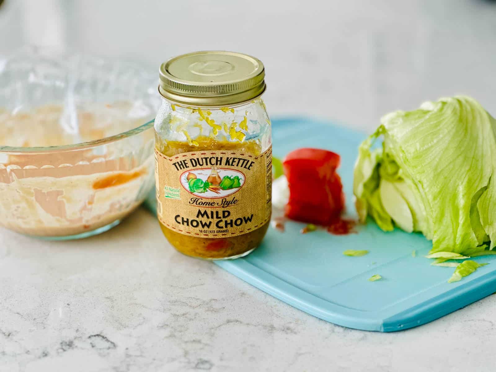 The ingredients to build the salad are on the counter. 