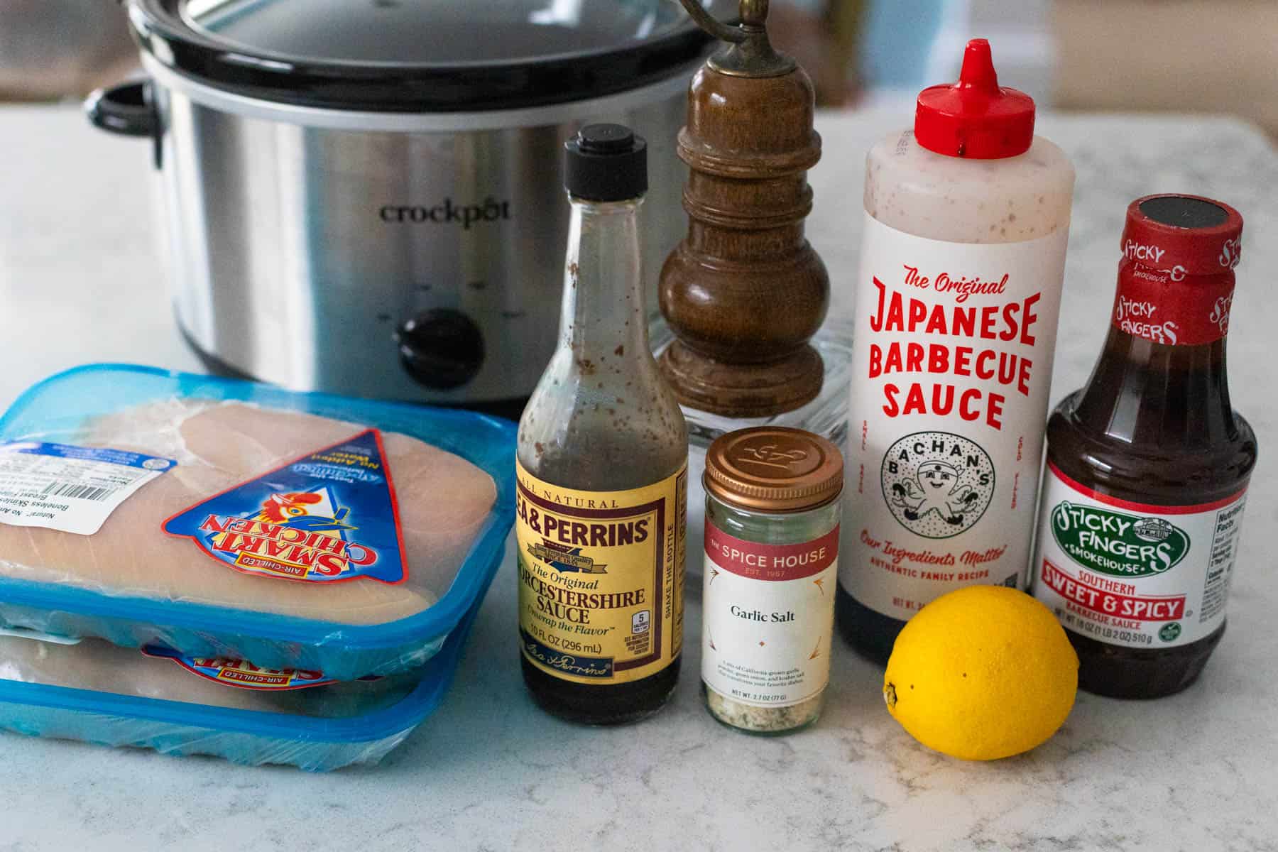 The ingredients to make Hawaiian chicken in the crockpot are on the counter.