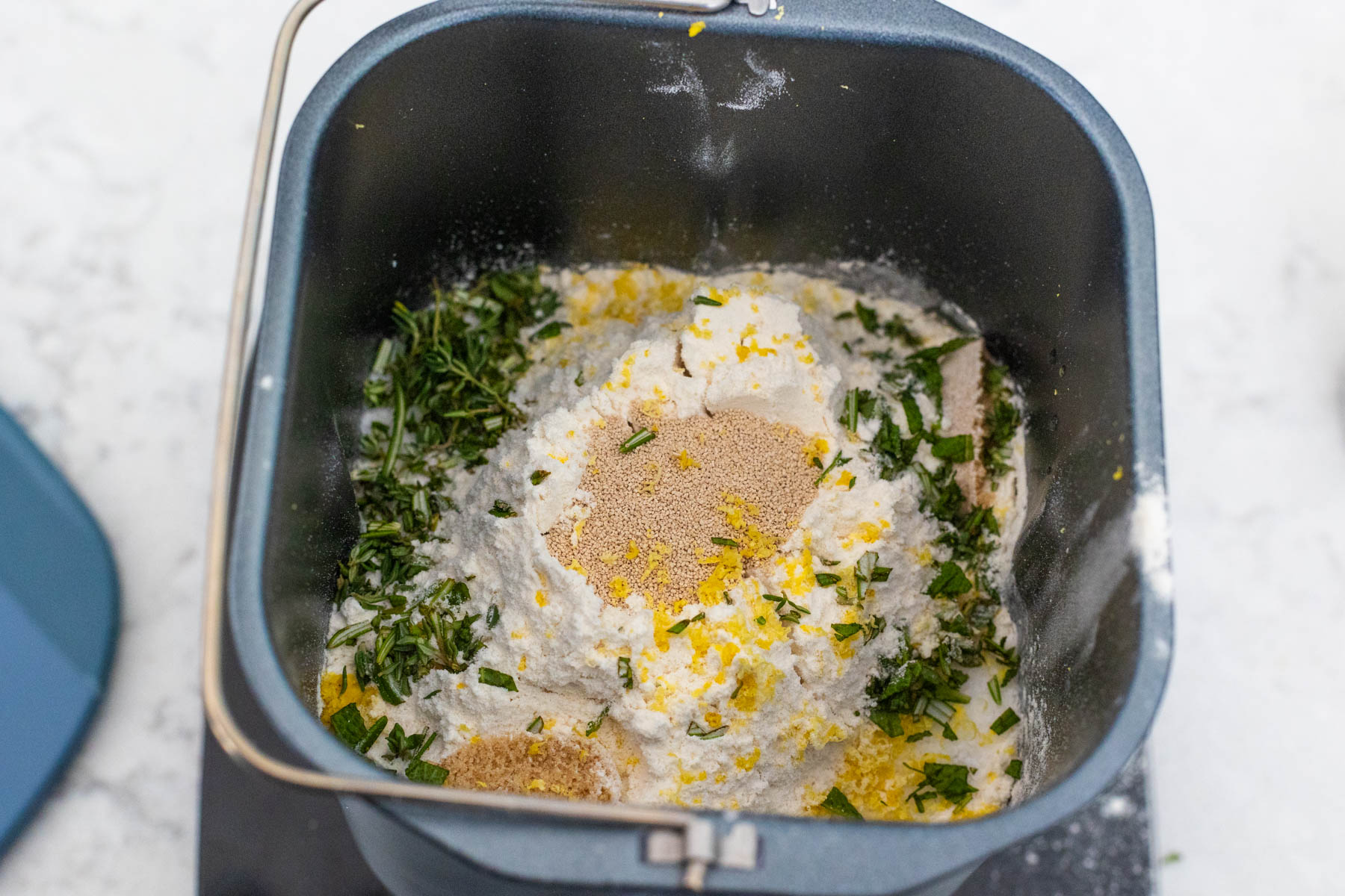 The fresh herbs have been added to the pan.