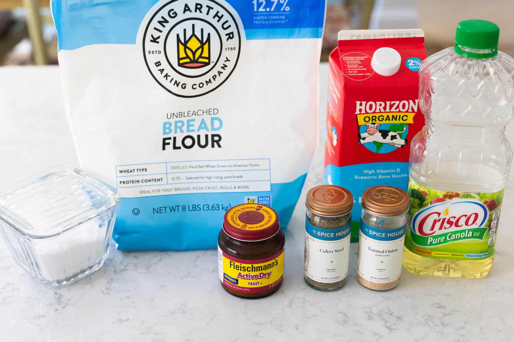 The ingredients to make celery bread in the bread machine are on the kitchen counter.