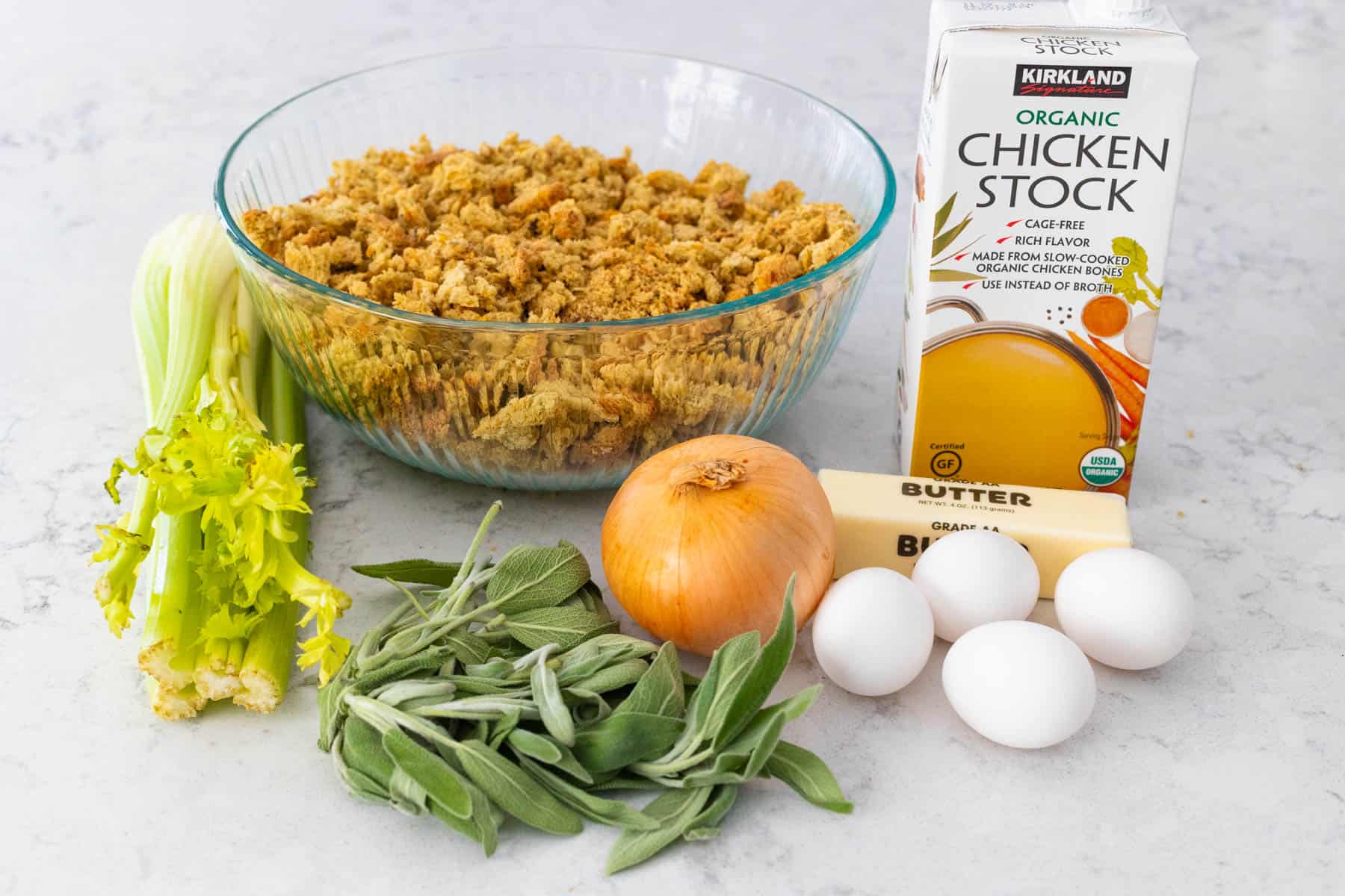 The fresh ingredients needed to make the homemade dressing are on the counter.