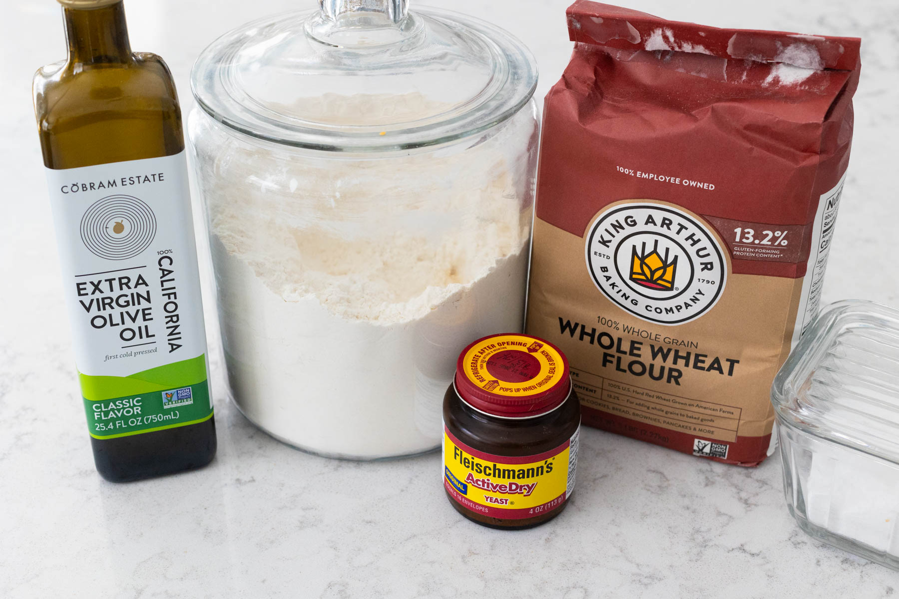 The ingredients to make the dough are on the counter.