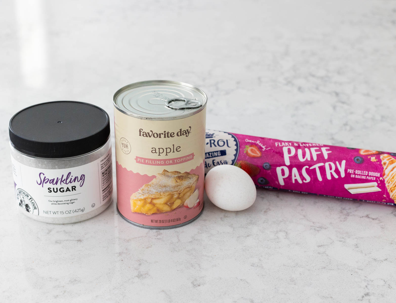 The ingredients to make the apple turnovers are on the counter.