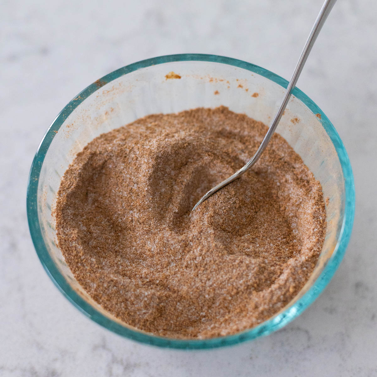 The sugar has been stirred into the spices.