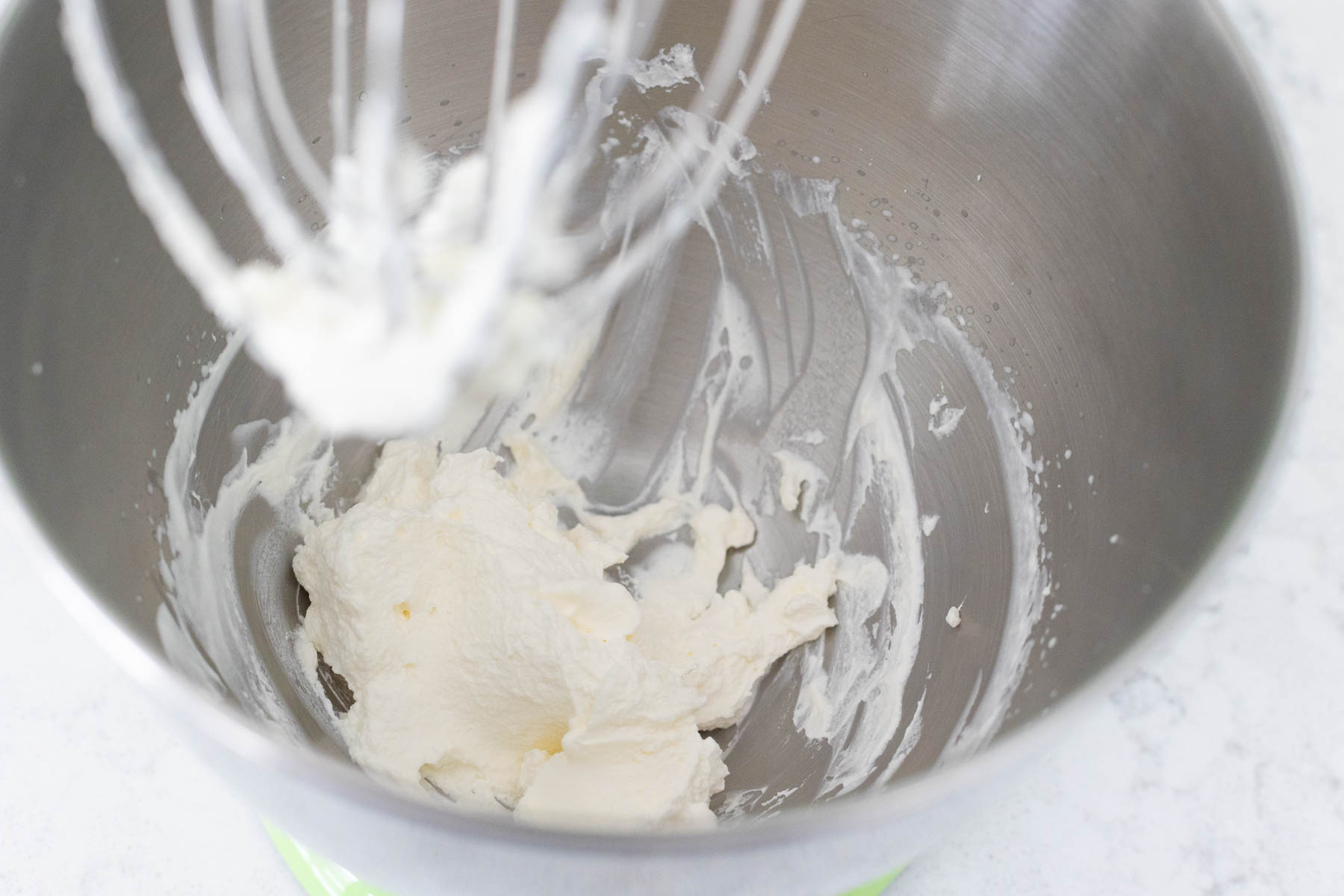 The cream has soft peaks.
