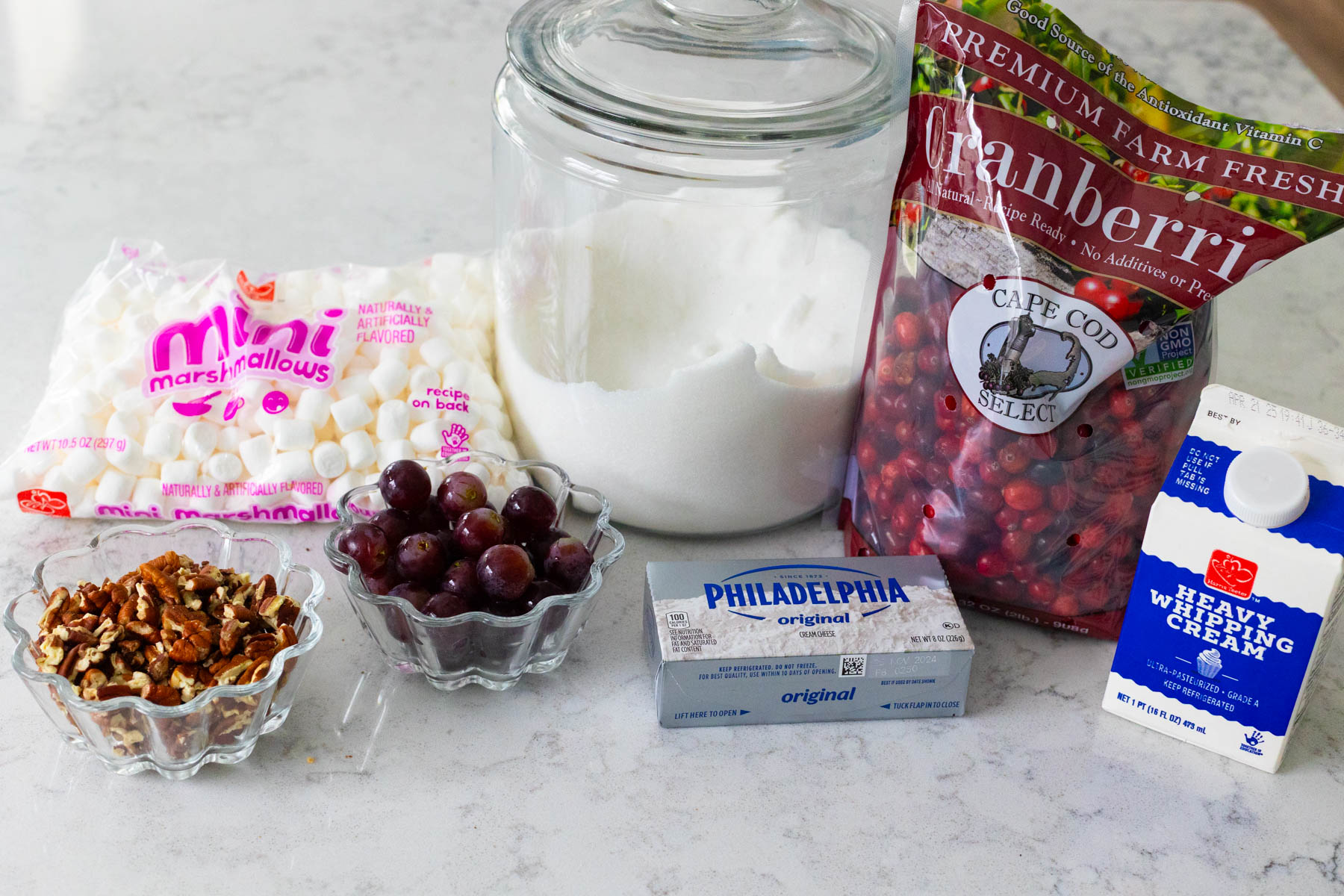 The ingredients to make the homemade cranberry fluff are on the counter.