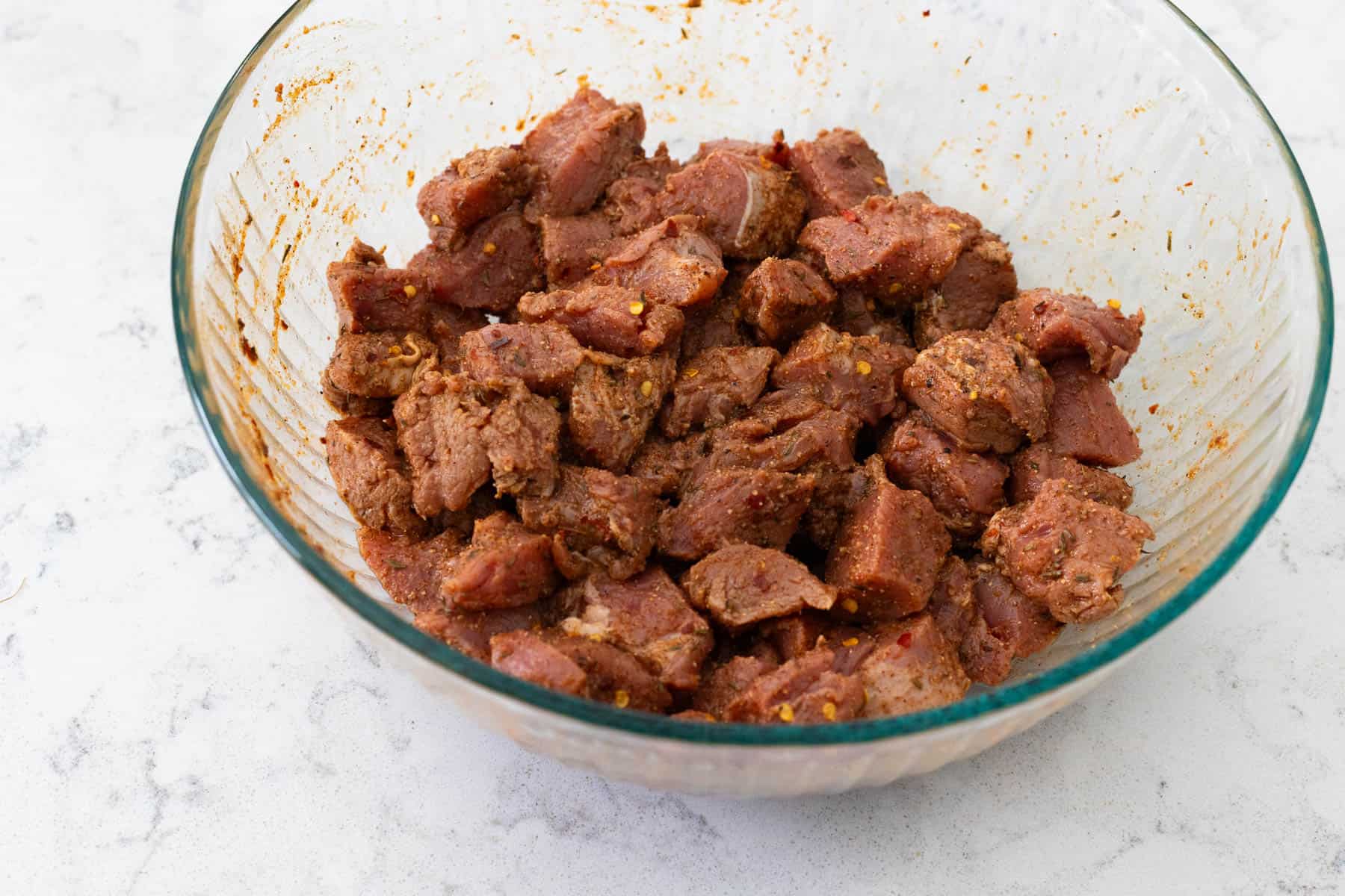 The pork chunks have been tossed in the marinade and are ready for the fridge.