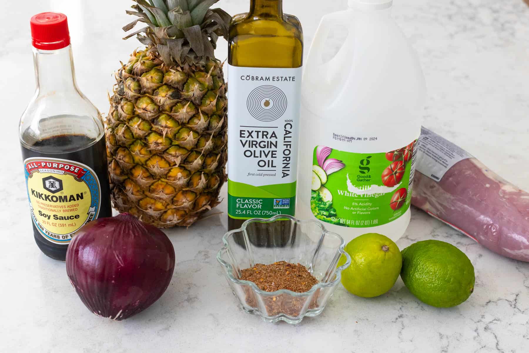 The ingredients to make the easy sheet pan dinner are on the counter.