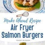 The salmon burger is on a brioche bun with lettuce and tomato. A drizzle of tartar sauce drips down the side.