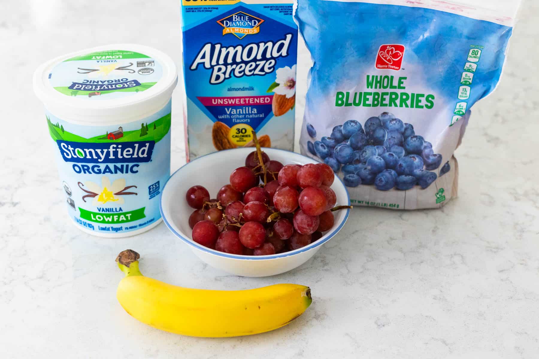The ingredients to make the smoothie are on the counter.