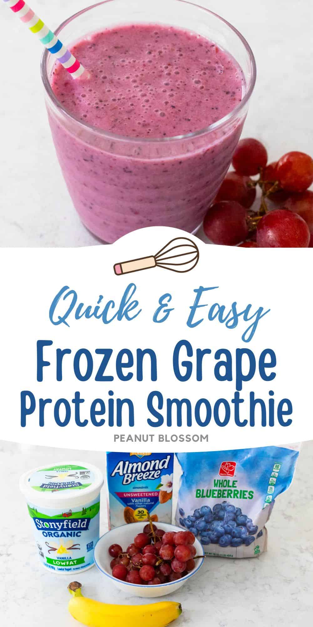 A deep purple grape smoothie in a cup with a straw and a cluster of grapes on the side.