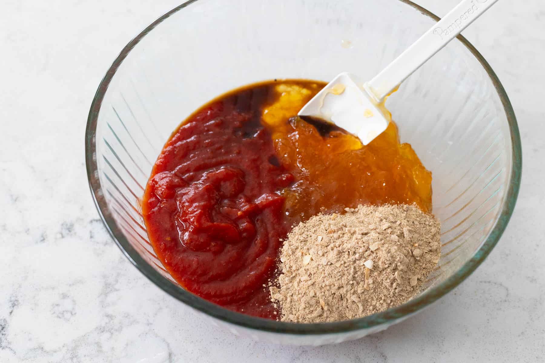 The ingredients used to make the glaze are in a mixing bowl ready to be mixed.