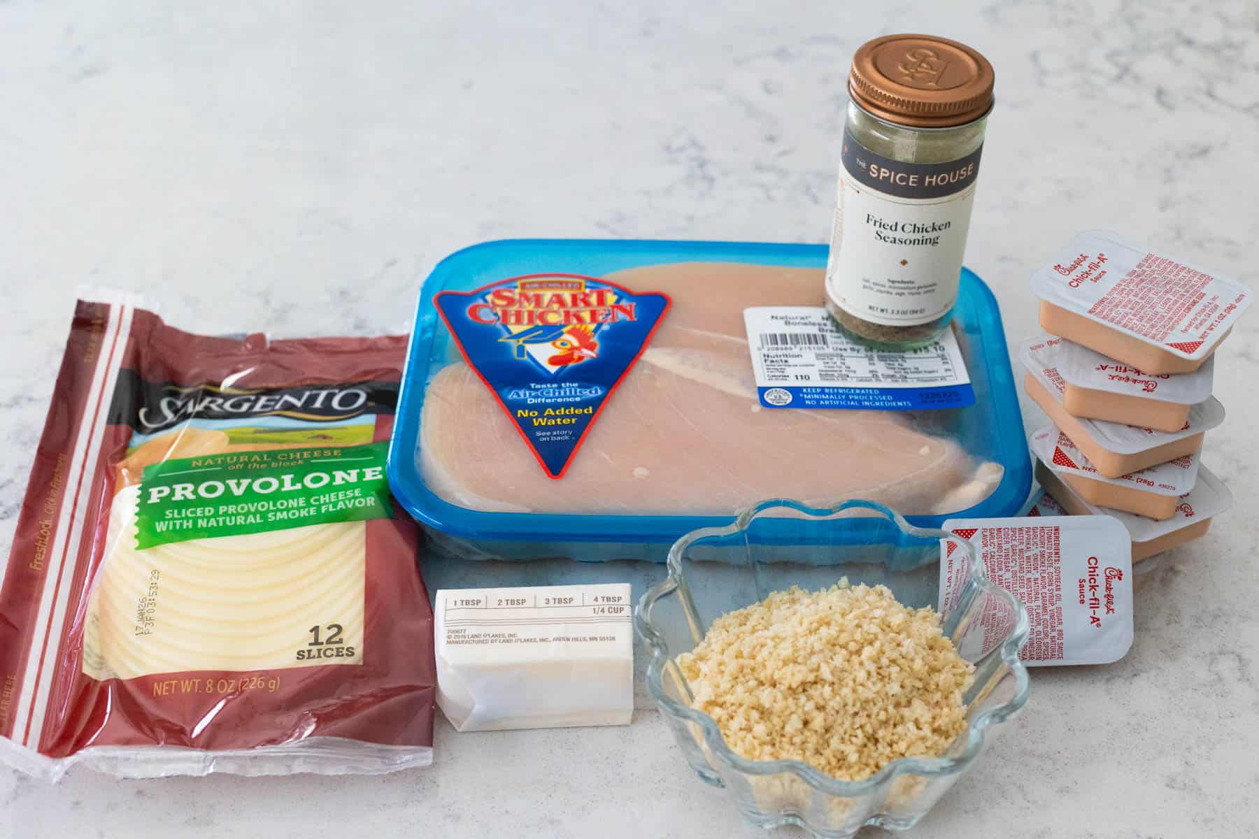 The ingredients to make Baked Chick-Fil-A Chicken are on the kitchen counter.