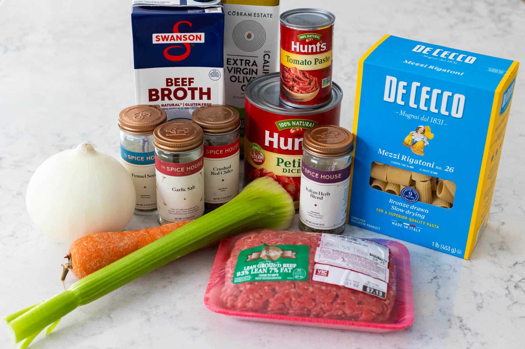 The ingredients to make Beef Rigatoni are on the kitchen counter.